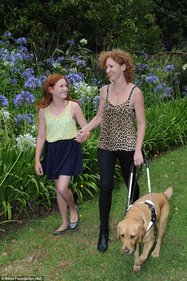1414638939034_wps_17_Lisa_Reid_and_her_dog_Hei